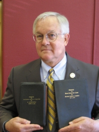 Retired Judge Darrell White with Bibles