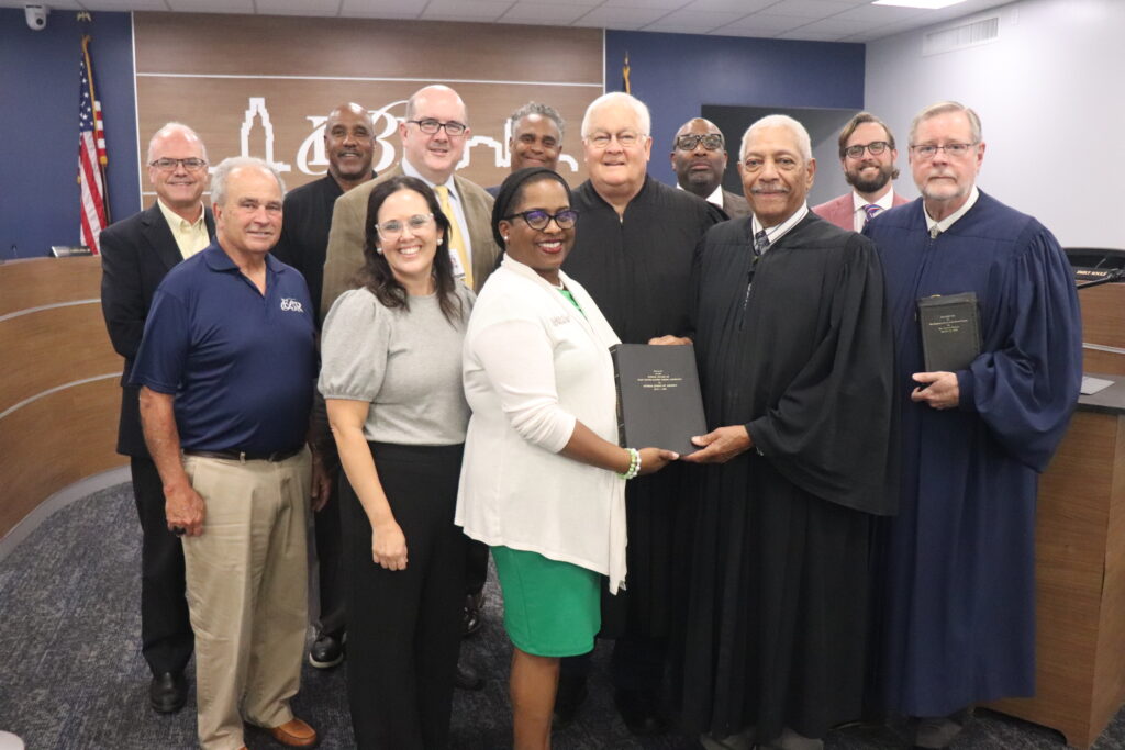 The East Baton Rouge School Board receives a Harlan Commemorative Bible from American Judicial Alliance